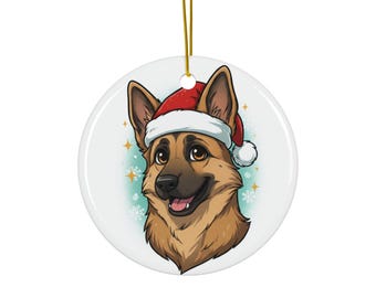 May include: A round, white Christmas ornament featuring a cartoon illustration of a German Shepherd dog wearing a red Santa hat. The dog has brown and tan fur, with a smiling expression. Gold string for hanging.