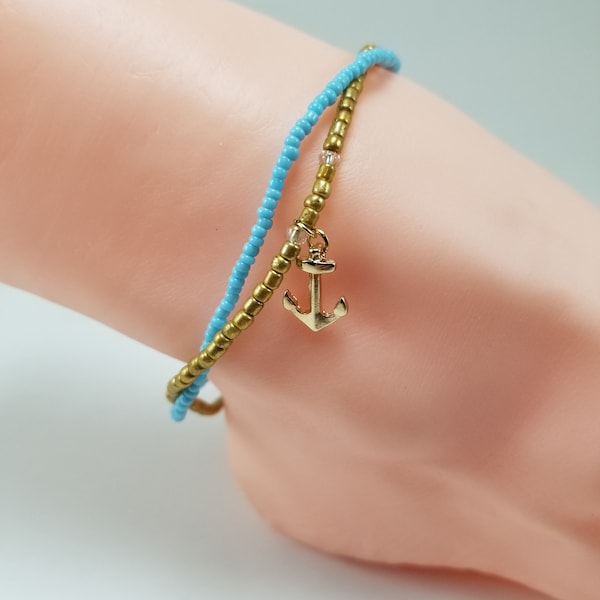 Nautical anklet with an anchor,double strand, blue and gold beads, perfect for summer and the beach.