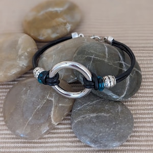 Silver and black leather bracelet