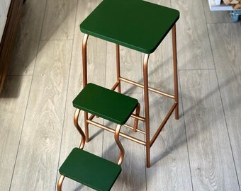 Green step stool. Wooden step ladder. Library steps. Bar stool. Plant stand. Fold out step stool. Library ladder. Kitchen step stool chair