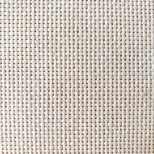 May include: Close-up of a white woven fabric with a grid pattern.