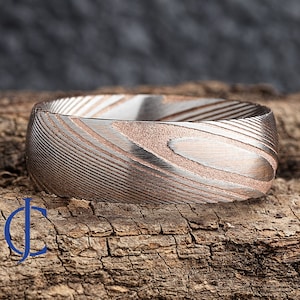 Damascus rose gold ring top