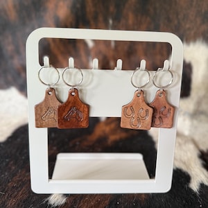 Cowhide leather cow tag keychain.