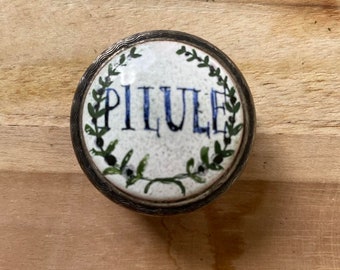 Vintage enamel face pill box