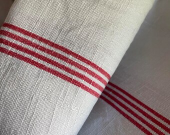 A single large red stripe Metis ( linen/cotton mix) tea towel