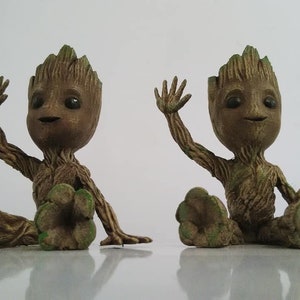 Sitting waving baby groot image 2