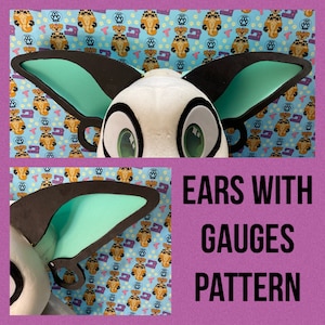 May include: A white faux fur head with two large, light blue ears with black trim. The ears have a pattern of small, light blue and black circles. The text "EARS WITH GAUGES PATTERN" is printed in black on a pink background.