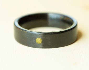 Brass Sun on Carbon Fiber