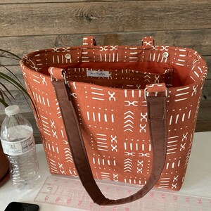 Tote - Símbolo