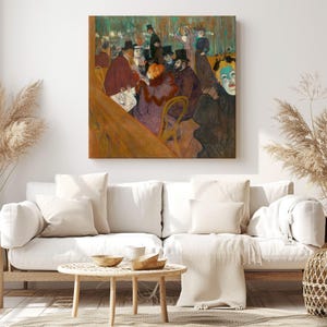 May include: A framed print of a painting showing a cafe scene with figures in period attire. The artwork features a seated group and a person with blue face paint. The color palette includes browns, reds, and greens, evoking a vintage aesthetic.