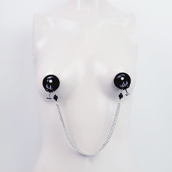 Nipple Press Clamps with Chain and Sparkling Beads. Nipple and Breast Torture Clamps with Teeth. MATURE, BDSM