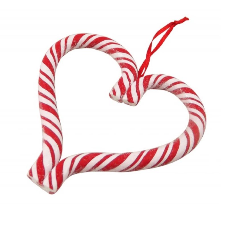 Puede incluir: Adorno navide&ntilde;o en forma de coraz&oacute;n con dise&ntilde;o de bast&oacute;n de caramelo. El adorno presenta rayas rojas y blancas y una cinta roja para colgar. Una decoraci&oacute;n festiva.