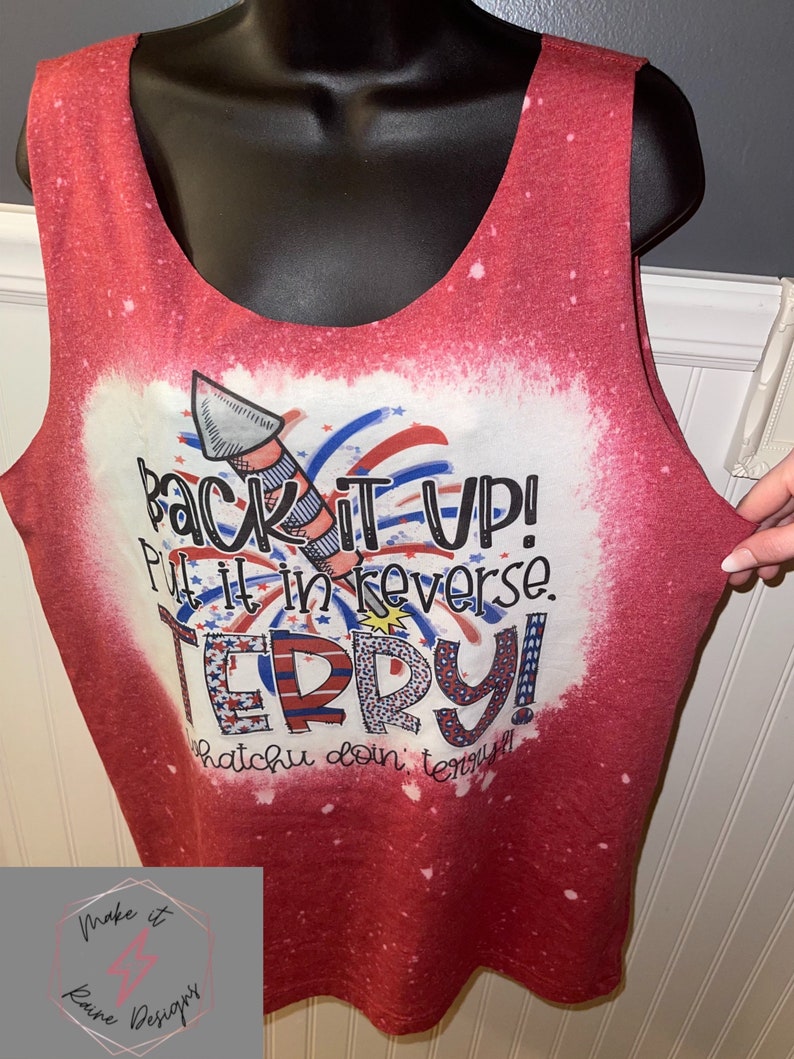 May include: Red sleeveless tank top with a white bleached design. The design features a firework, the text "Back it up! Put it in reverse. Terry! Whatchu doin' terry!"