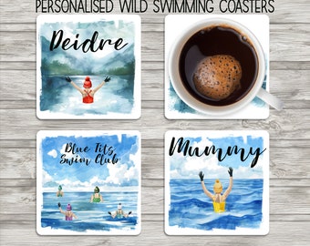May include: Four personalized coasters with watercolor illustrations of people swimming in the ocean. The coasters feature the names "Deidre", "Blue Tits Swim Club", "Mummy", and a cup of coffee.