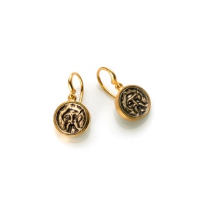 Mouth of truth earrings in bronze and brass