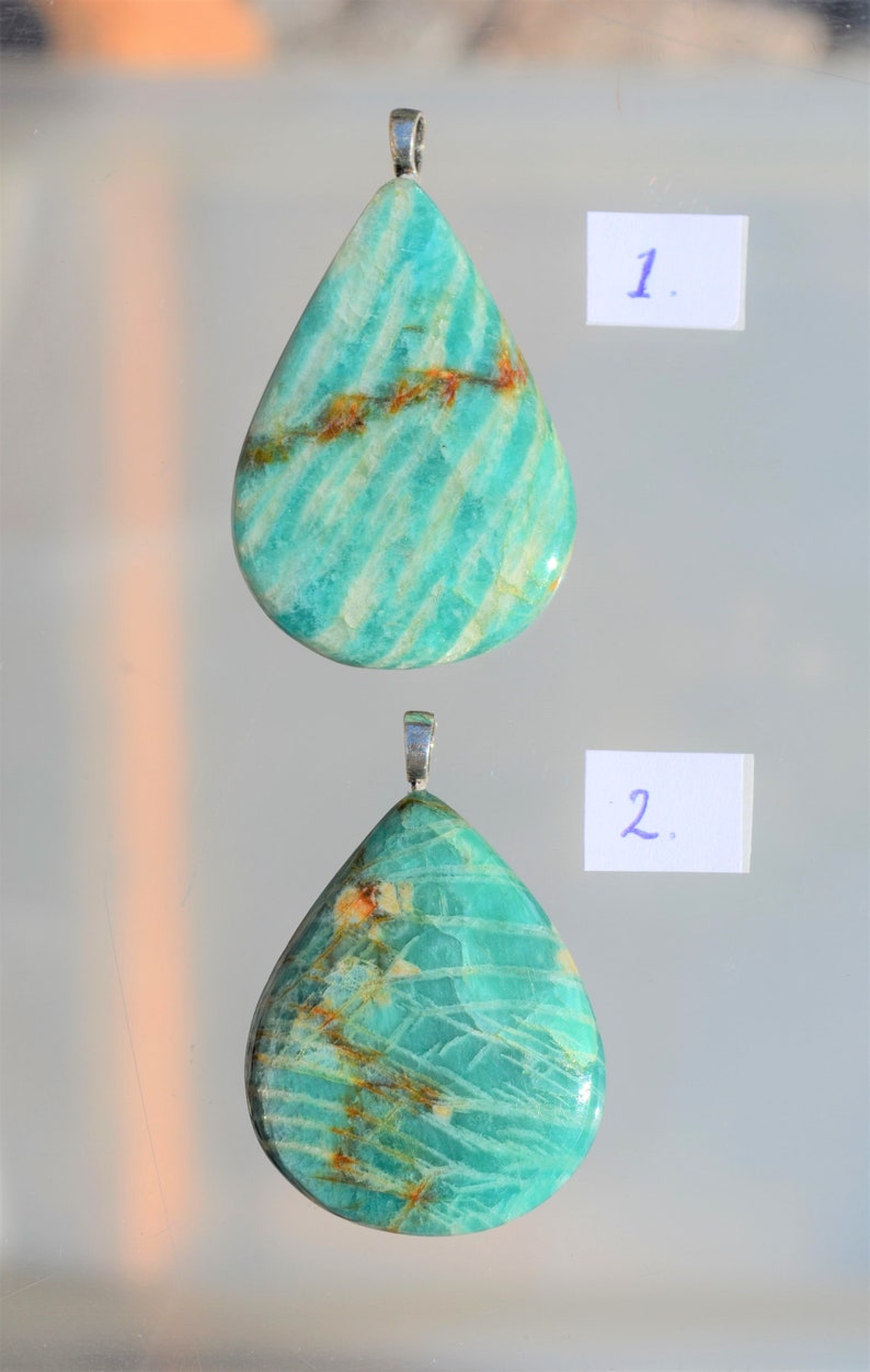Beautiful drop-shaped cut gemstone from Amazonite as a necklace with a sterling silver pendant eye. semi