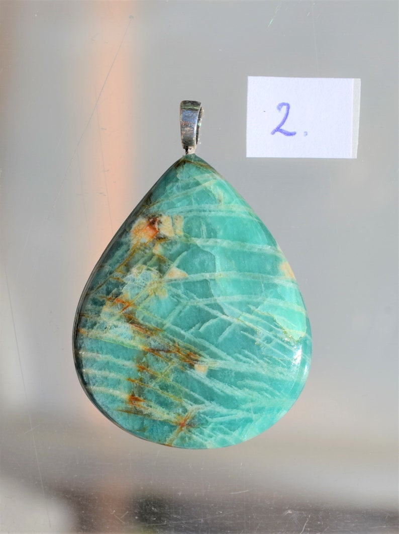 Beautiful drop-shaped cut gemstone from Amazonite as a necklace with a sterling silver pendant eye. semi