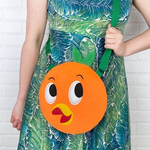 Bolso bandolera de felpa con forma de pájaro naranja