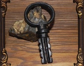 Antique key. Ancient barn key. Large rusty key. 18th century.