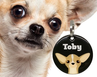 May include: A black and white dog tag with a chihuahua silhouette and the name "Toby" printed in white. The tag is attached to a silver chain and is worn by a chihuahua.