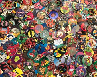 100 miscellaneous variety pogs from the 90's + 1 poison plastic slammer and 1 metal slammer.