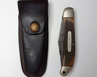 Jdtt5wu91ys 6m Even though the old timer brand wasn't created until 1958, its roots date back to 1904 when george schrade formed the schrade cutlery company in walden. https www etsy com market old timer knife