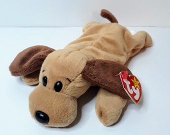 brown and white stuffed dog