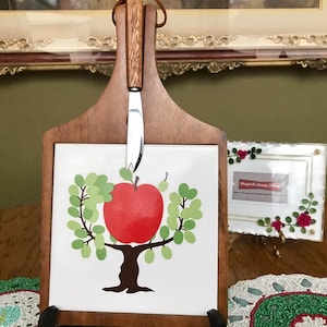 1960s Cheese cutting Board with original stainless steel knife featuring an Apple in a Tree