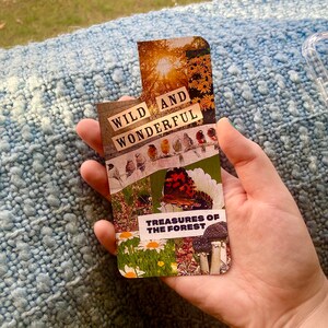 May include: A collage card with a nature theme. The card features a green, brown, and white background with images of birds, butterflies, mushrooms, and flowers. The text on the card reads "Wild and Wonderful" and "Treasures of the Forest".