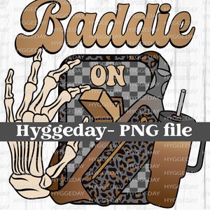 May include: A digital graphic with the word "Baddie" in brown retro font. The image includes a skeleton hand, a phone with a checkered pattern, and a coffee cup. The text "ON" is also visible.