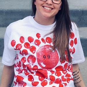How many red balloons? If someone counts them as you go by there are 99