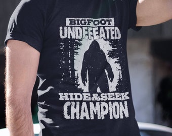 Funny Bigfoot Shirt Undefeated Hide and Seek Champion Sasquatch TShirt Unique Bigfoot Gift Short-Sleeve Unisex Tee T-Shirt