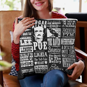 May include: Black and white throw pillow with a design featuring the name Edgar Allan Poe and titles of his famous works, including "The Raven", "The Tell-Tale Heart", and "The Murders in the Rue Morgue".