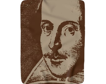 May include: A brown and beige blanket featuring a detailed portrait of William Shakespeare. The image is a close-up of the playwright's face, with a focus on his eyes, mustache, and beard. The blanket has a soft, textured appearance.