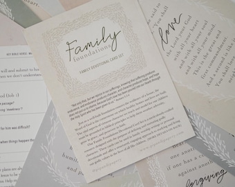 May include: A set of cards with white floral designs and inspirational quotes about family, love, and forgiveness. The cards are part of a devotional card set called "Family Foundations".