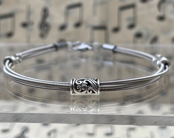 Guitar String Bracelet: Unisex Music Lover Gift, guitar jewellery, guitarists gift. Musicians bracelet. Guitar related gift. Concert goers.