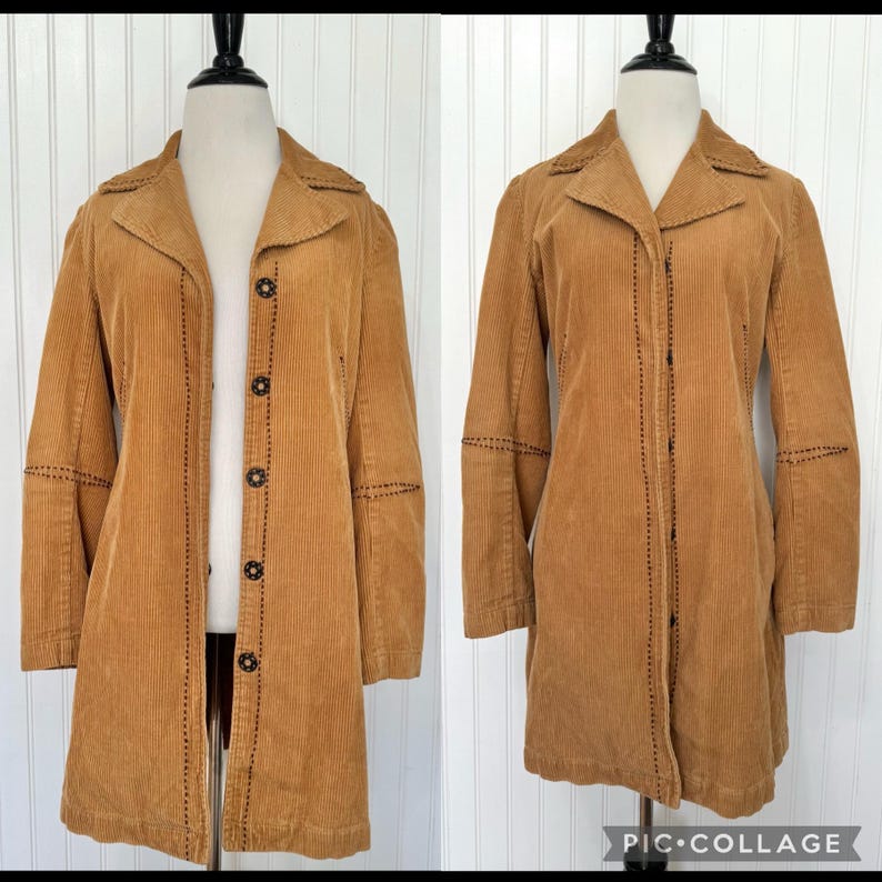 May include: A tan corduroy coat with a notched collar and button closure. The coat features decorative stitching along the seams and cuffs. The coat is displayed on a mannequin.