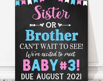 May include: A chalkboard sign with pink and blue bunting at the top. The sign says "Sister or Brother Can't Wait to See! We're excited to meet Baby #3! Due August 2021".