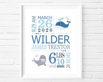 May include: A blue and white baby announcement print with a whale and walrus illustration. The print includes the baby's name, Wilder James Trenton, birth date March 26, 2020, time 8:29 AM, weight 6 lbs 10 ounces, and length 20 inches.
