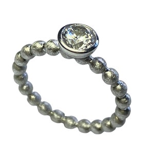 Ball ring with faceted zirconia, handmade