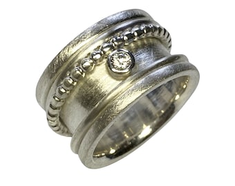 Rotating ring with zirconia and ball ring, goldsmith's work