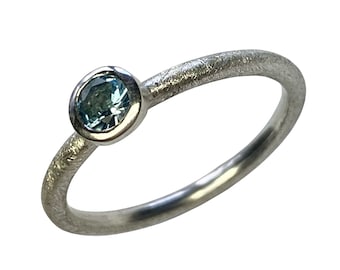 Stacking ring with a faceted topaz, handmade