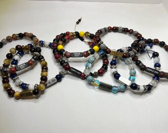 Graduation bracelet. Help commemorate your special someone with these one-of-a-kind bracelets made with school colors and graduating year.