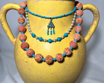 Orange and yellow sponge Coral and genuine, faceted turquoise