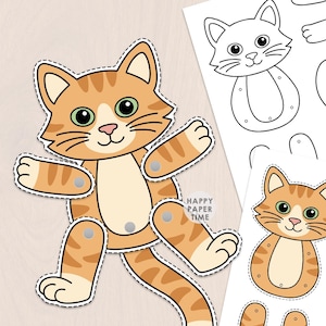 Peut inclure: Un kit de bricolage en papier représentant un chat tigré orange aux yeux verts, assemblé avec des attaches métalliques pour des membres mobiles. L'ensemble comprend un chat coloré, une version en noir et blanc et des pièces détachées.