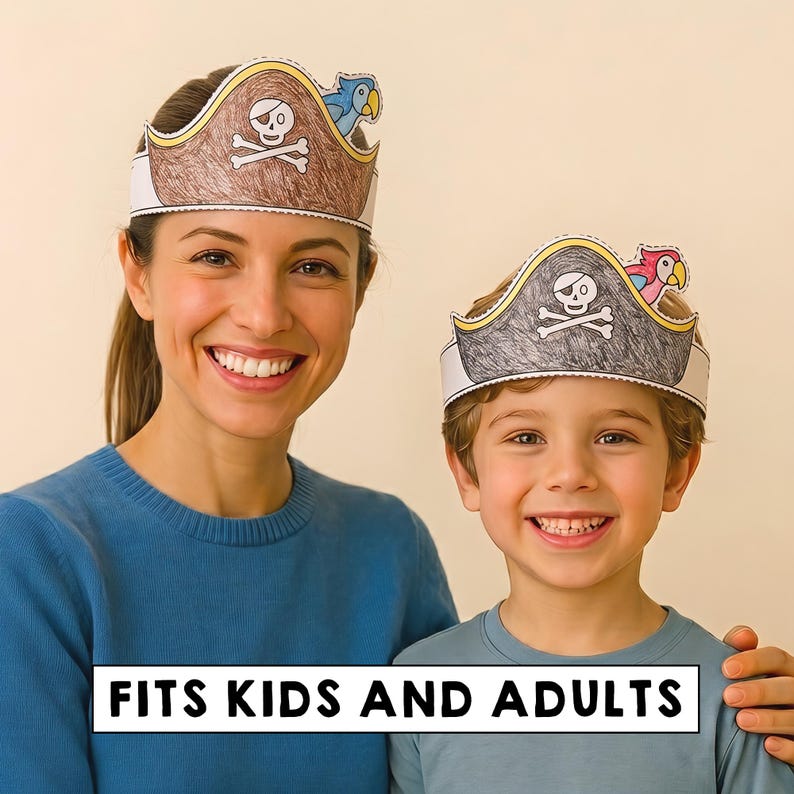 May include: Two paper pirate hats featuring a skull and crossbones design with a colorful parrot accent. The hats are colored with brown and grey pencil textures and include the text FITS KIDS AND ADULTS printed on a white rectangular banner.