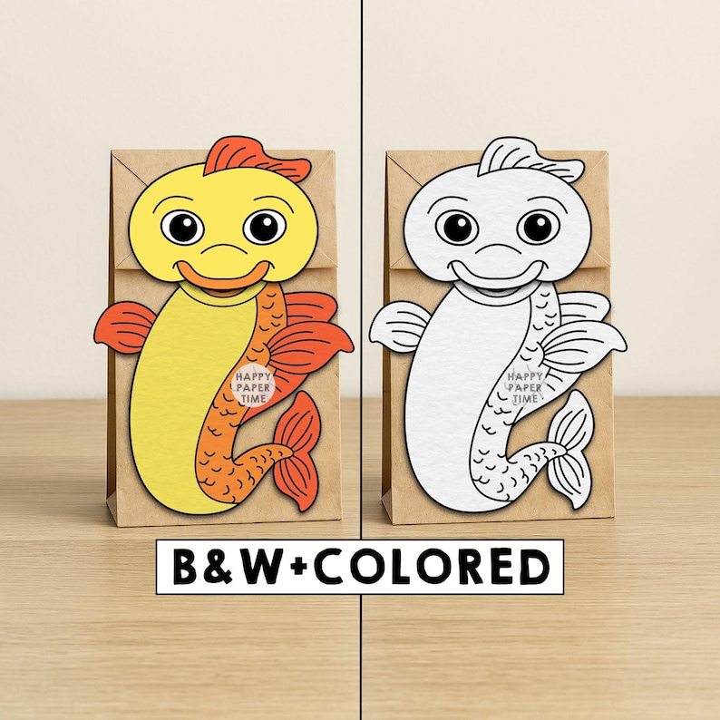 May include: Two brown paper bags, each with a fish design. One fish is yellow and orange, the other is white. The text "HAPPY PAPER TIME" is on the fish. The text "B&W+COLORED" is below the bags.