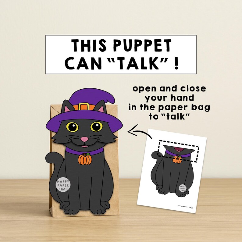 Puede incluir: Una marioneta de gato negro con un sombrero de bruja morado y un collar de calabaza naranja est&aacute; unida a una bolsa de papel marr&oacute;n. El texto "THIS PUPPET CAN 'TALK'!" est&aacute; encima de la marioneta. Se incluyen instrucciones.