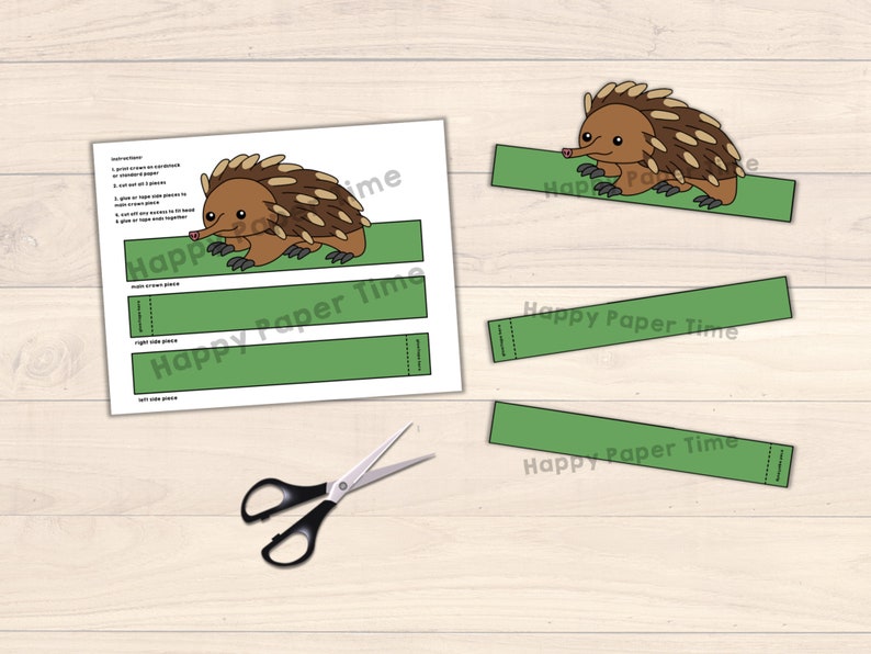 May include: Printable craft template for making an echidna headband. The template includes a brown and tan echidna with a green headband. The text "Happy Paper Time" is printed on the template.