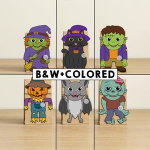Puede incluir: Seis bolsas de papel con tem&aacute;tica de Halloween. Los personajes incluyen una bruja, un gato negro, el monstruo de Frankenstein, un espantap&aacute;jaros, un murci&eacute;lago y un zombi. El texto "B&W+COLORED" est&aacute; impreso en el centro de la imagen.